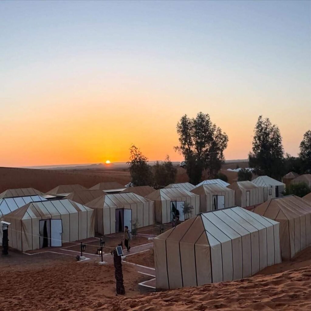 Luxury desert camp at sunset during 5 Days Tour from Marrakech to Merzouga