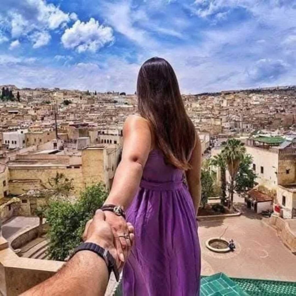 A traveler overlooking the historic city of Fez on a 5 Days Tour from Marrakech to Fes.