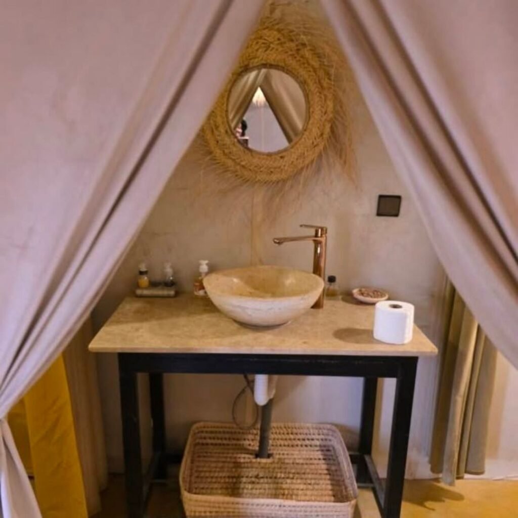 Elegant bathroom setup in a luxury desert camp on a 5 Days Tour from Marrakech to Fes